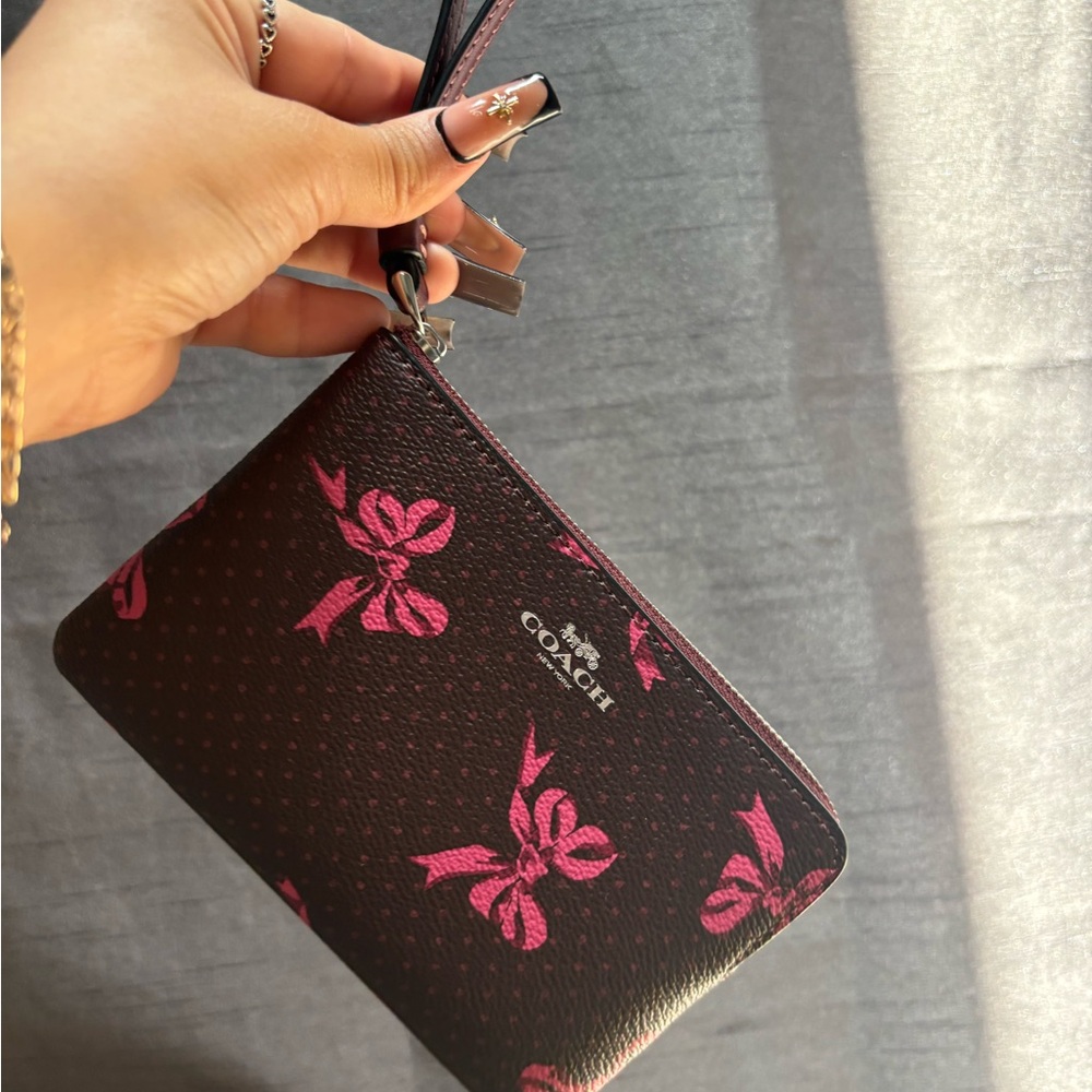 Coach Black and Pink Clutch with Elegant Design